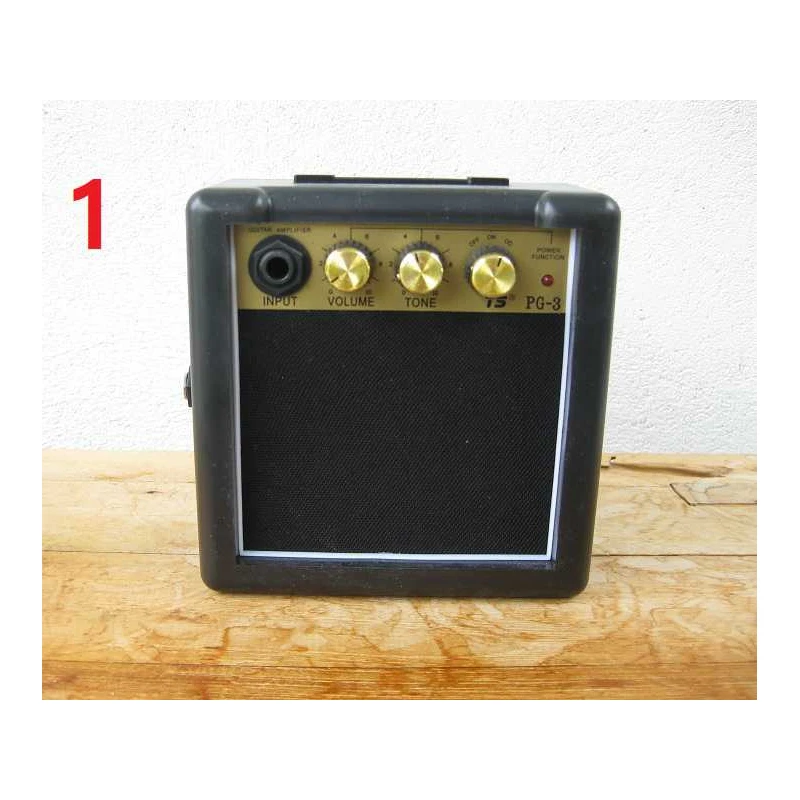 ECHTE Mini (gitaar)versterker Speaker 5 Watt (9V) met jack in- en uitgang